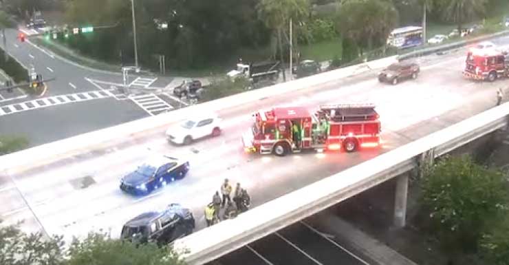 SUV queda parcialmente colgando de un paso elevado de la I-275 el jueves por la mañana